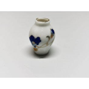 Lille vase med bl blomst (ny)