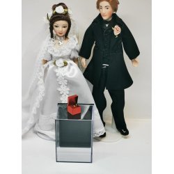 2 ringe i "slv" i rd ske (hndlavet)