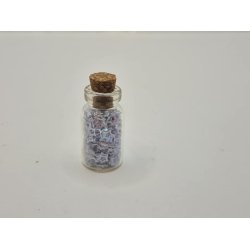 Glas med korkprop og sm glimmer stjerner (brugt)