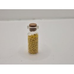 Glas med korkprop og sm gule perler (brugt)