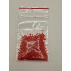 Pose med rdt strelse