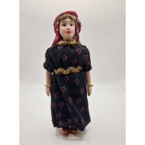 Dukke fra Yemen eller Tunesien i porceln inkl stativ.  16 cm 