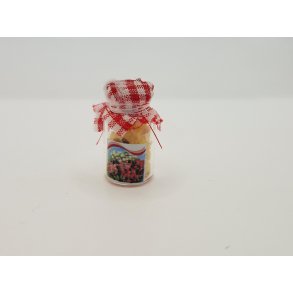 Krukke i glas med indhold og stof lg (brugt/som ny)