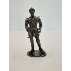Ridder i rustning. I metal (vintage)