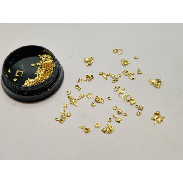 2 dse med div sm "guld" pynt (nye)