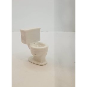 Lille toilet uden sde i porceln (brugt)