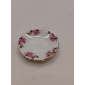 Hvidt stel med lyser�de blomster Tallerken i porcel�n (brugt/som ny) 1:12