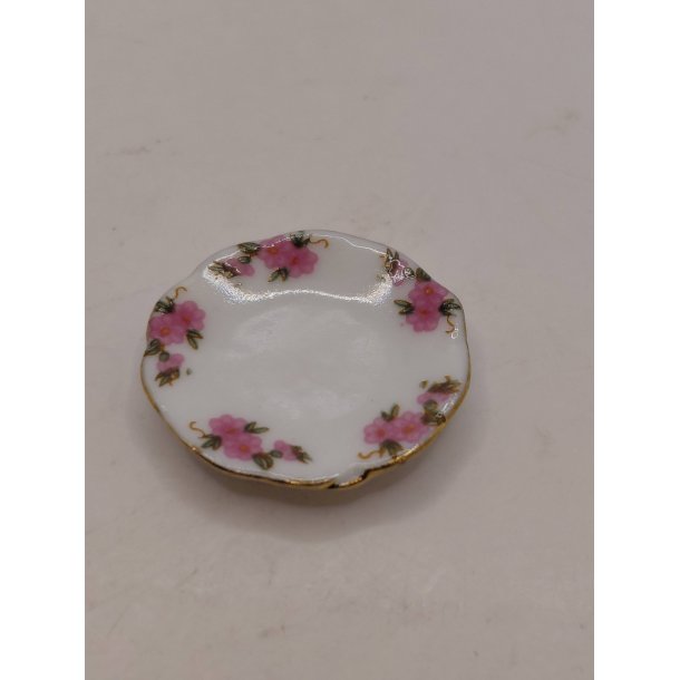 Hvidt stel med lyser�de blomster Tallerken i porcel�n (brugt/som ny) 1:12