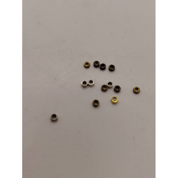 12 meget sm� m�trikker i metal (brugte)