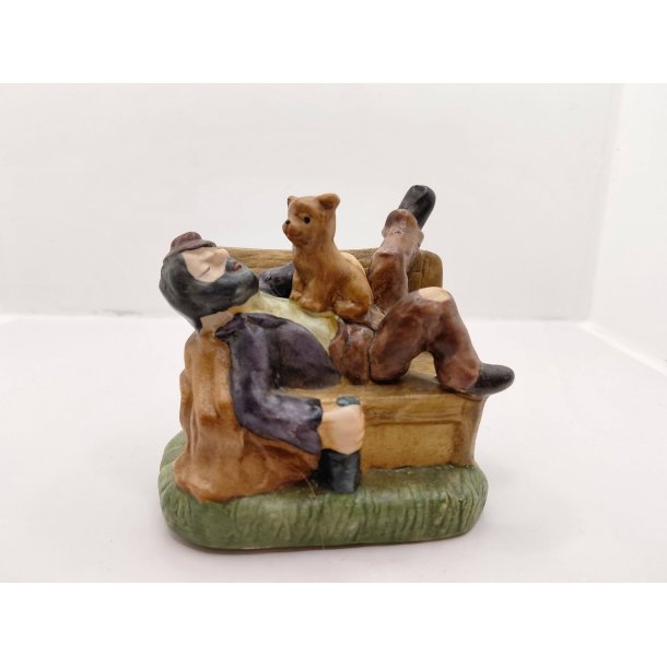 Vagabond p� b�nk med �l og hundehvalp (vintage)