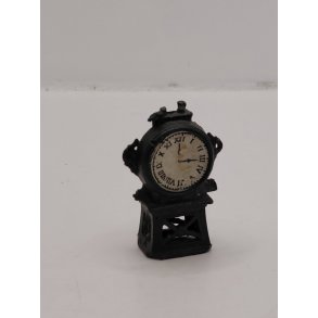 Kamin ur i metal (antik/med patina)
