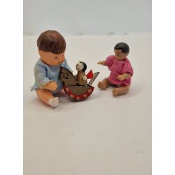 Gyngehest med dukke i tr (brugt)