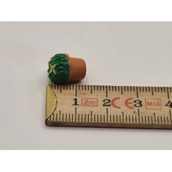 Meget lille potteplante i plastik (brugt)