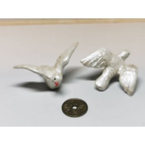 Fugl i porceln med spredte vinger (hndlavet)