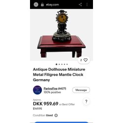 Filigree kamin ur i metal (antik)