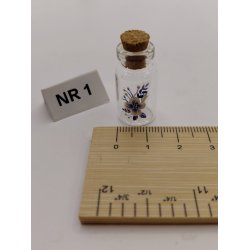 Krukke med korkprop og bl� blomster (ny)