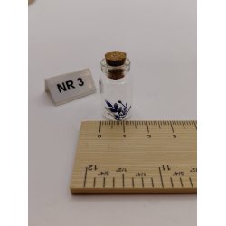 Krukke med korkprop og bl� blomster (ny)