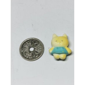 Lille dukke i plastik (brugt)