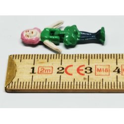 Lille dukke i grn kjole (brugt)