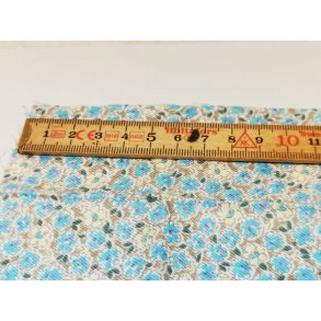 Stof med turkis blomster 38 x 19 cm