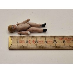 Meget lille dukke i porceln (antik)