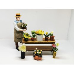 Sort vase med blomster (brugt)